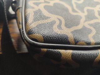 Bolso bandolera Tous negro y beige
