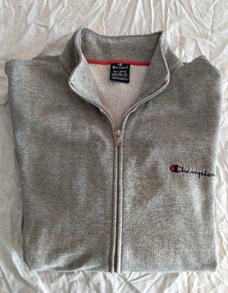 SUDADERA CHAMPION GRIS CON CREMALLERA.