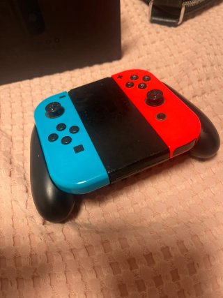 Nintendo Switch con Joy-Con Azul y Rojo