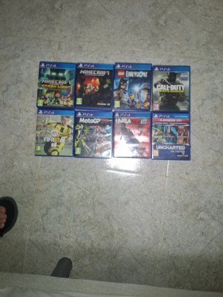 PS4 Slim 1TB Negra + Mando + 8 Juegos + cargador