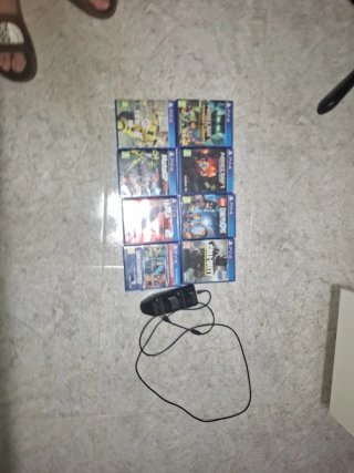 PS4 Slim 1TB Negra + Mando + 8 Juegos + cargador