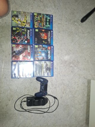 PS4 Slim 1TB Negra + Mando + 8 Juegos + cargador