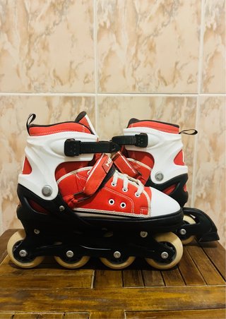 Patinete infantil rojo y blanco