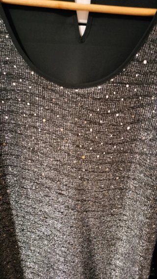 Blusa elegante con brillos
