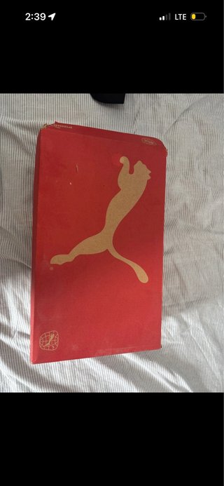 Botas de fútbol Puma blancas y azules