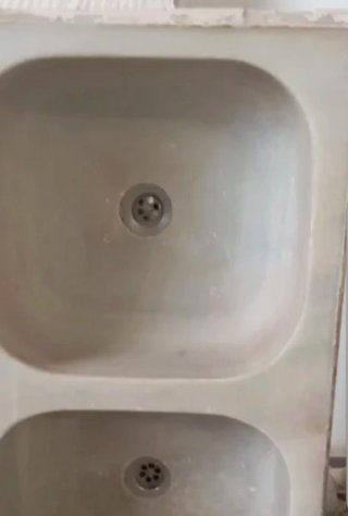 Fregadero doble seno mármol.