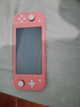 Nintendo Switch Lite Coral + mando