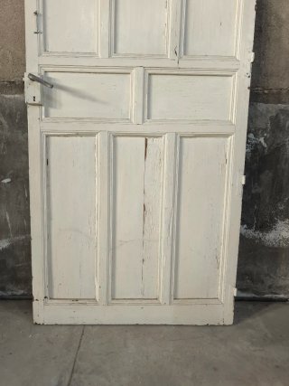 Antiguas puertas de doble hoja con cuarterones