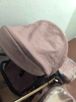 Carrito trio de bebé Neri rosa urge por falta de e