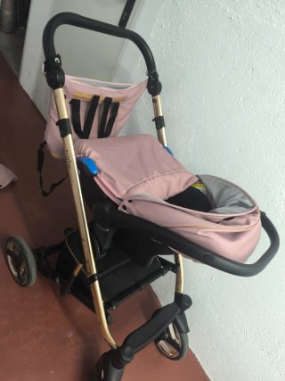 Carrito trio de bebé Neri rosa urge por falta de e