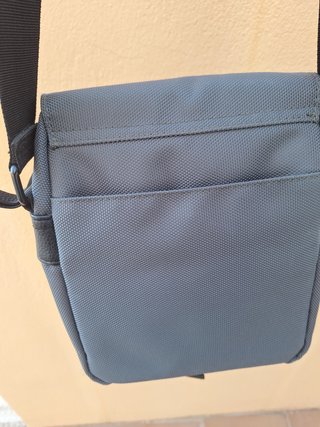 Mochila de mano gris