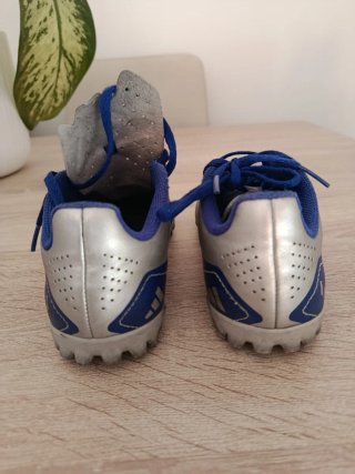 Botas de fútbol multitaco Adidas niño