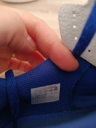 Botas de fútbol multitaco Adidas niño