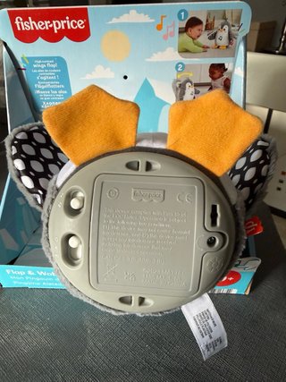 Pingüino de peluche Fisher-Price con música