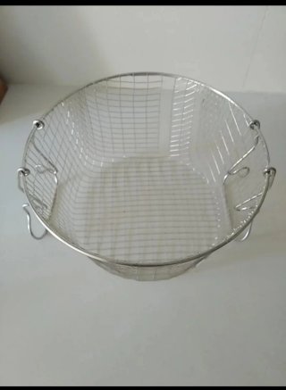 Escurridor de metal y pelador