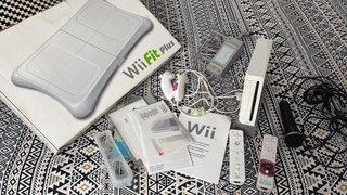 Nintendo Wii Fit Plus + Accesorios