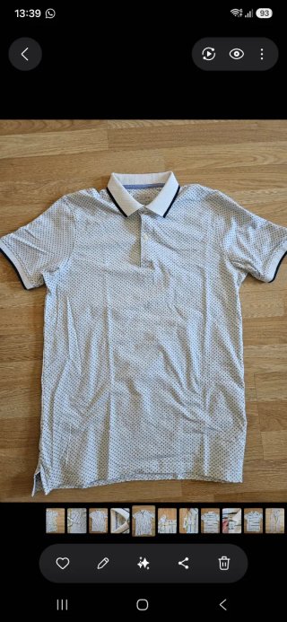 Polo Sfera Blanco con Lunares Negros