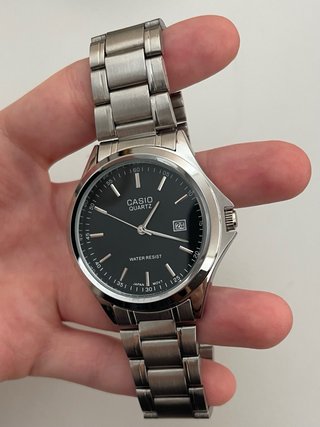 Reloj Casio MTP Plateado y Negro