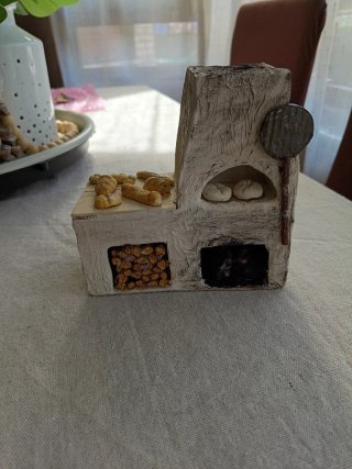Horno de Belén con pan y leña