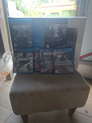 PS4 (PlayStation 4) Negra + Juegos con la caga fun