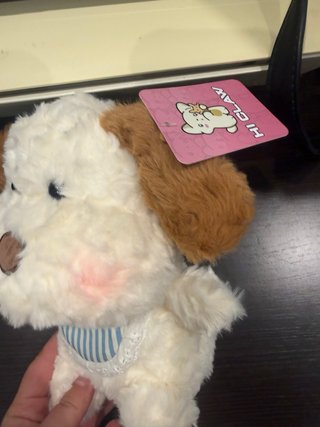 Peluche perro blanco con orejas marrones