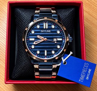 Reloj Skyline Azul y Dorado