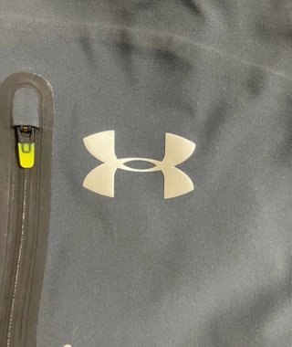 Chubasquero Under Armour Gris