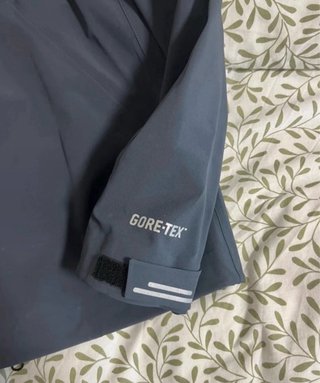 Chubasquero Under Armour Gris