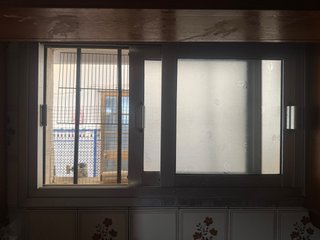 Ventana Corredera con Reja