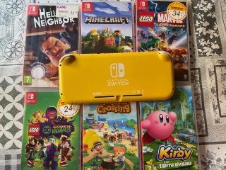 Nintendo Switch Lite + 6 Juegos