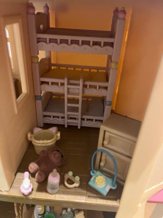 Casa de luces Sylvanian families + 12 figuras