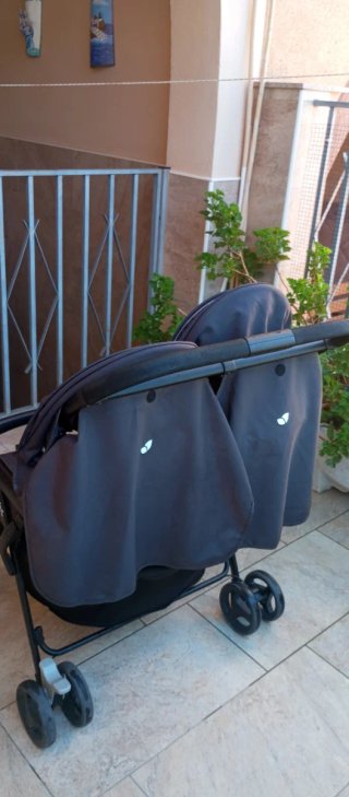 Carrito gemelar Joie gris
