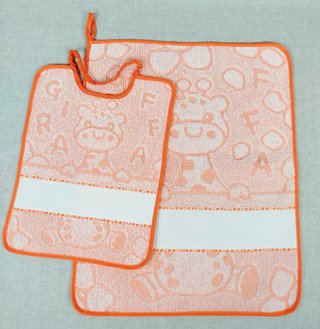 Set bavaglino e asciugamano arancio