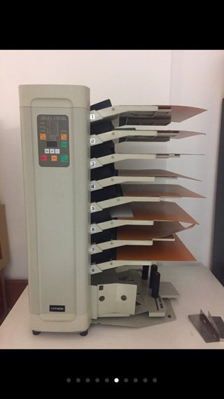 Alzadora Uchida UC-800