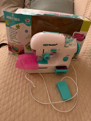 Maquina de coser juguete