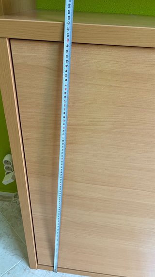 Cama abatible con estanterías