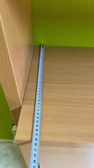 Cama abatible con estanterías