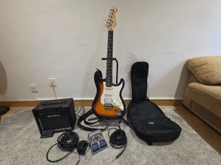 Guitarra Eléctrica y Amplificador Harley Benton