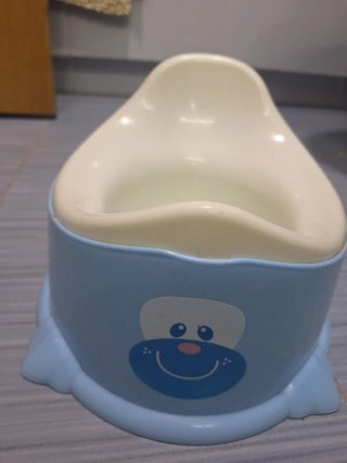 Orinal infantil azul con cara de oso