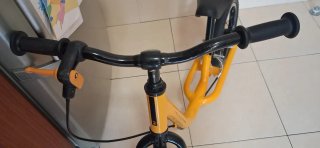 Bicicleta sin pedales Btwin 12 amarilla