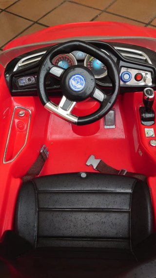 Cochecito deportivo automático rojo