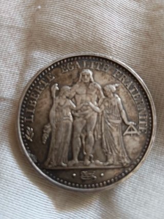 Monedas 100 Pesetas y 10 Francos