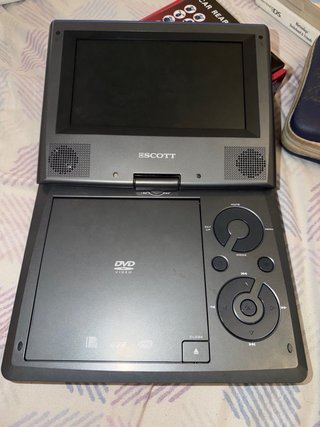 Reproductor De DVD Portátil Y Accesorios
