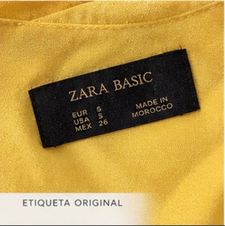 Blusa amarilla sin mangas