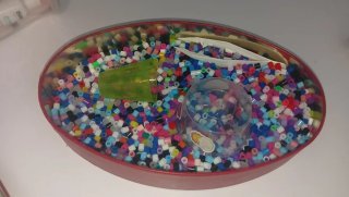 Caja de Beads con pinzas y accesorios