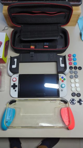 Nintendo Switch OLED Blanca + Mando Pro + 7 Juegos