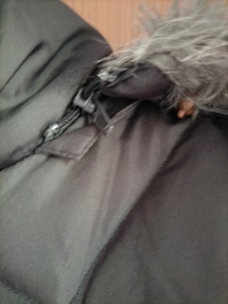 Cazadora de plumas gris
