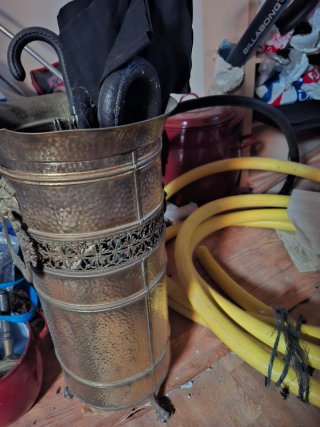 Paragüero vintage de metal dorado