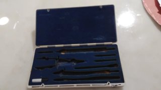 Estuche de compás antiguo