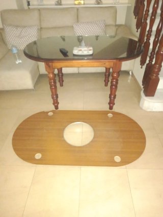 Mesa de comedor de cristal y madera